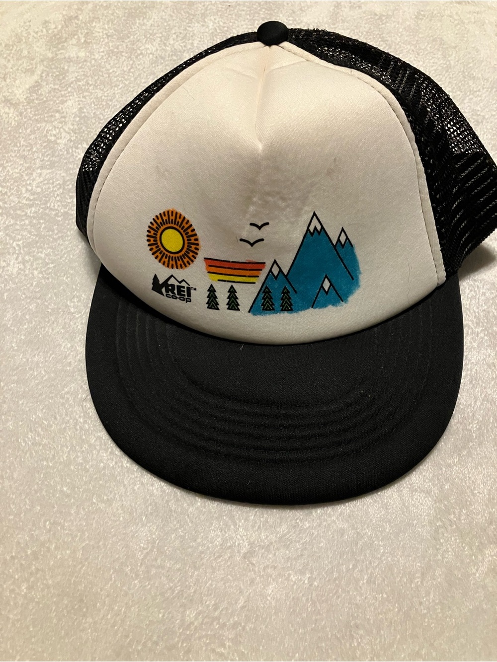 White and Black Trucker Hat with Mountain Graphic